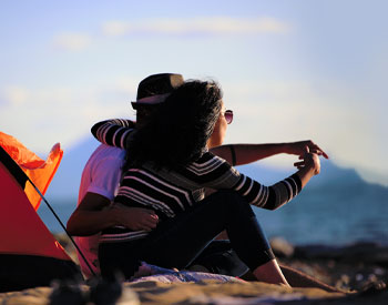 Coouple on Beach Camping at Campsite.